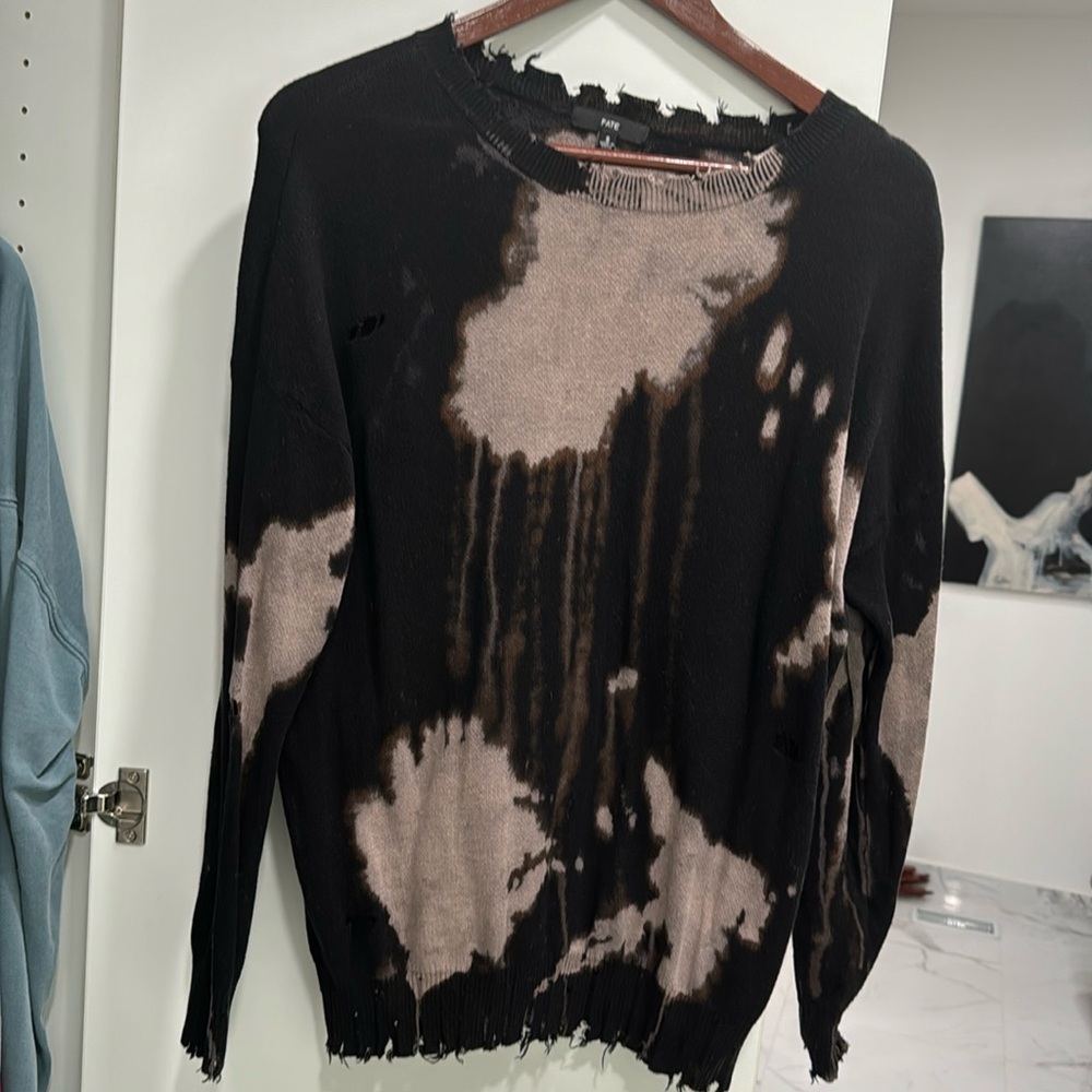 Distressed sweater